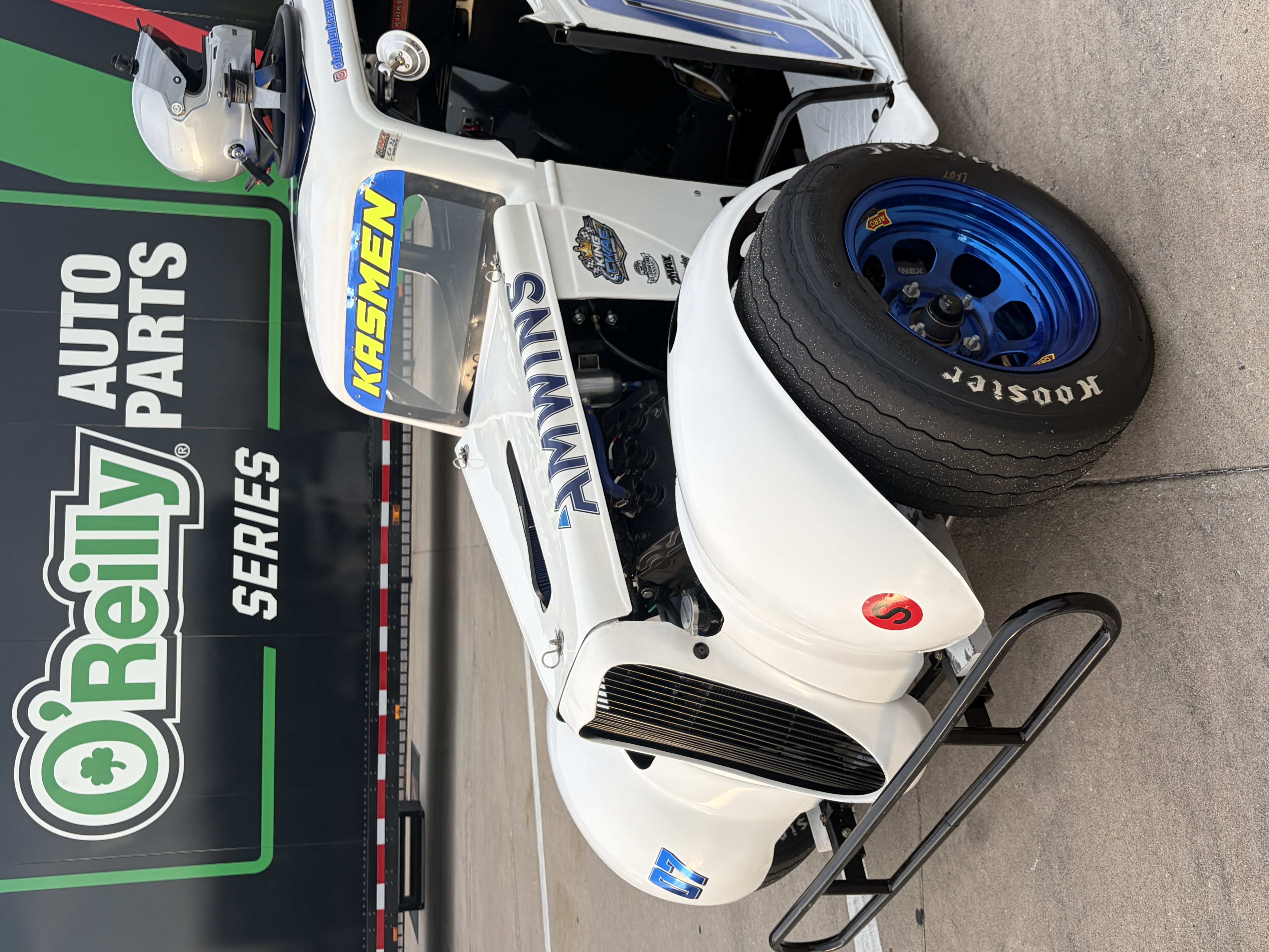 Hayden's No. 07 Legends car parked in front of the O'Reilly Auto Parts Series trailer