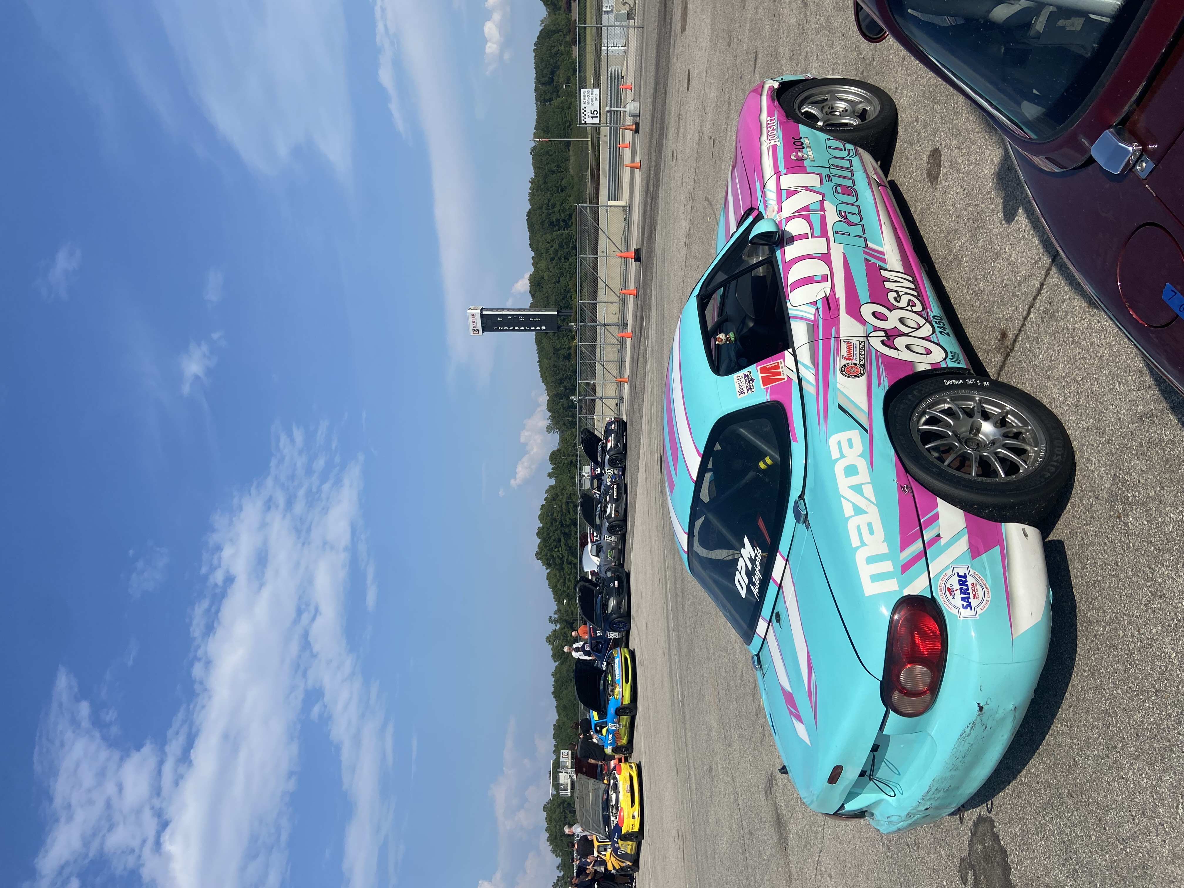 The No. 68 OPM Racing Spec Miata parked at Barber Motorsports Park
