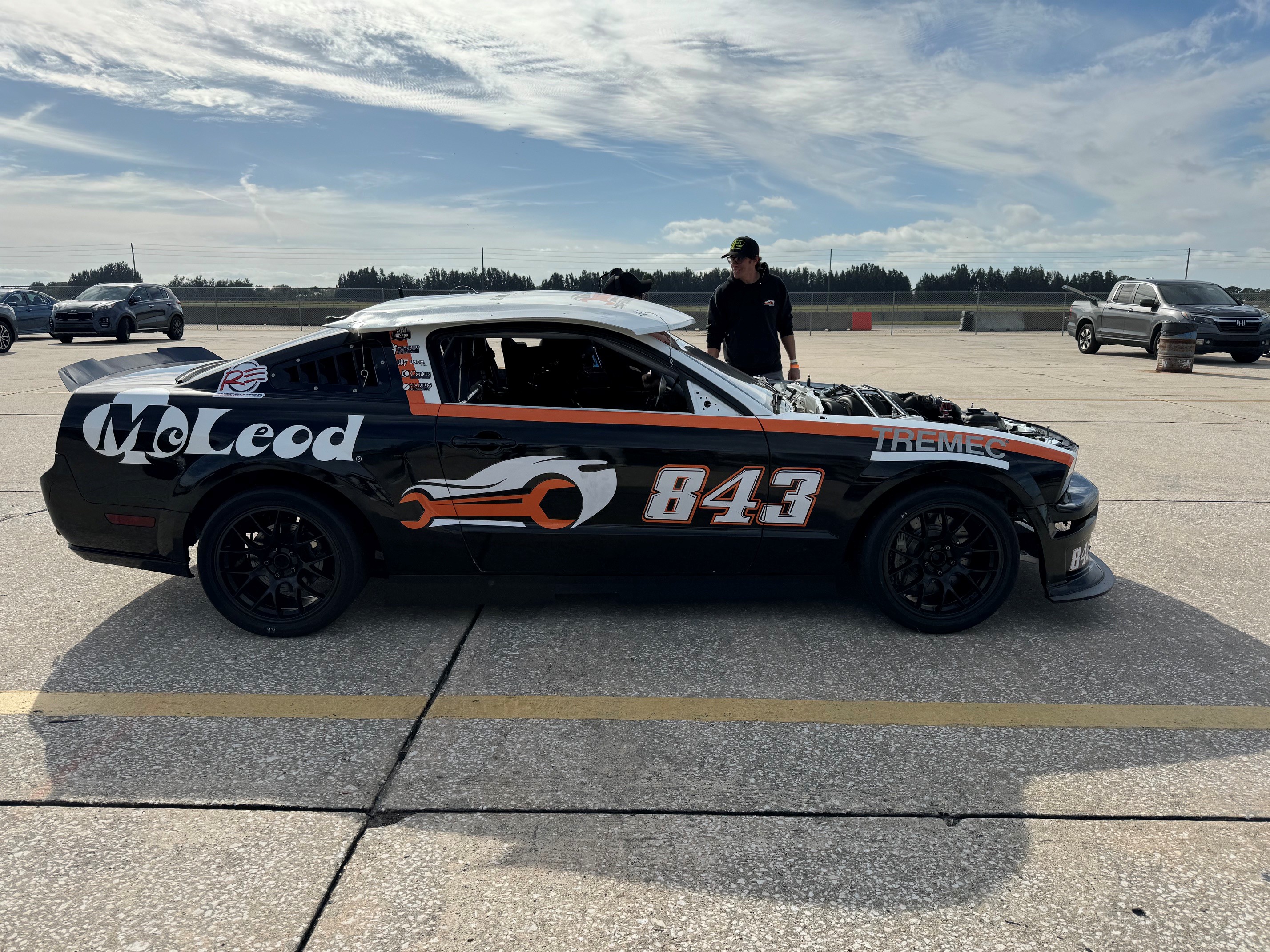 The No. 843 Low Country Motorsports Mustang parked in the paddock
