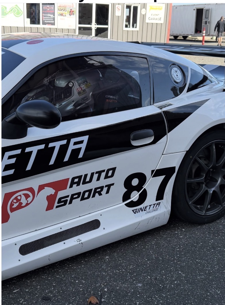 Close-up side profile of the No. 87 PT Auto Sport Ginetta race car
